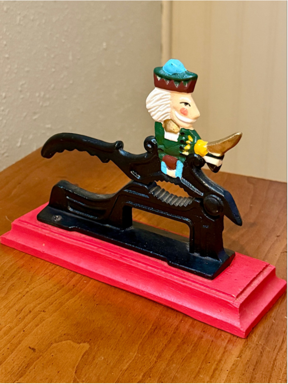 Vintage Painted Cast Iron Nutcracker on Red Wooden Base Christmas Decor